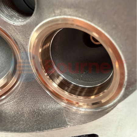 Close up of Honda K20 Cylinder Head Beryllium Valve Guides and Seats.