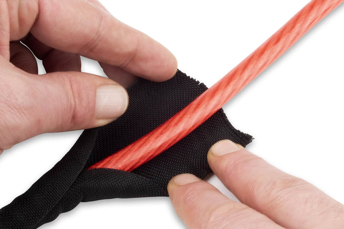 Black self-wrap heat protection sleeving by Funk Motorsport, designed for heat resistance and easy installation.