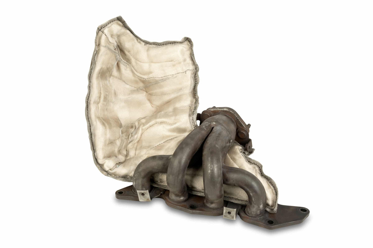 Funk Motorsport Ford Fiesta ST150 exhaust manifold blanket, heat-resistant exhaust protection for improved engine safety.