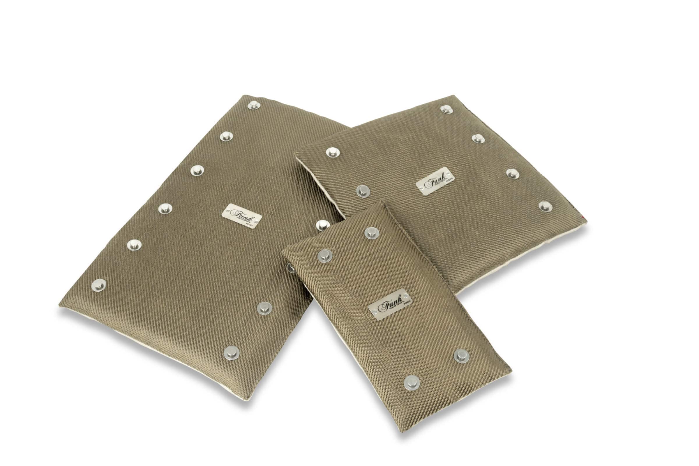 Funk Motorsport exhaust blanket wrap around for exhaust protection, showing a heat-resistant blanket wrapped around a vehicle exhaust pipe.