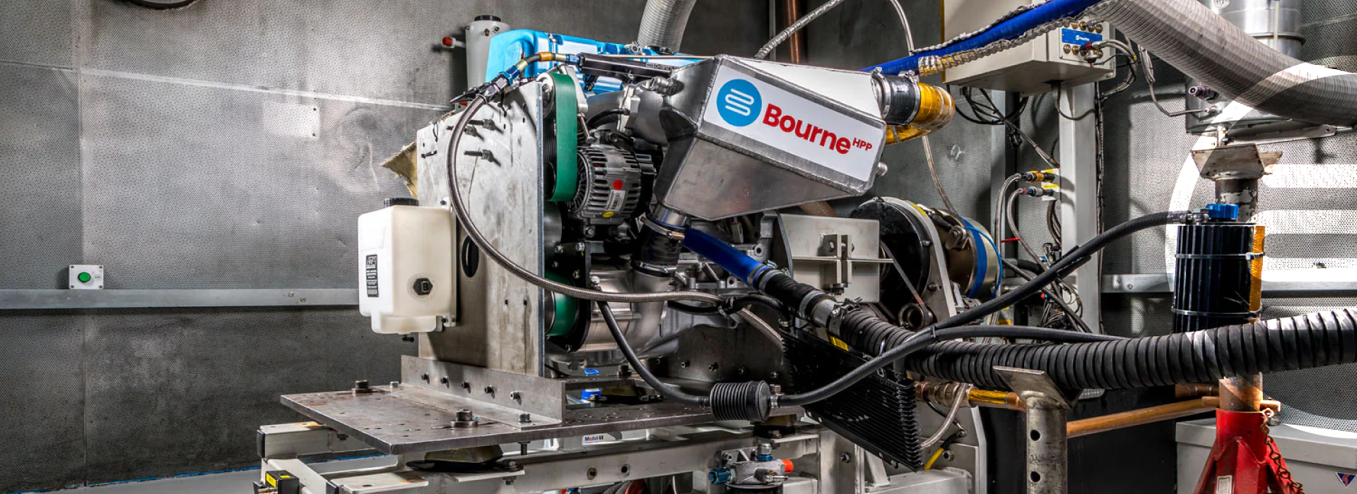 Industrial machine with 'Bourne' branding in a workshop setting
