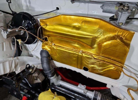 Funk Motorsport adhesive reflective gold heat blanket used as intake protection, showing a gold heat shield with adhesive backing.