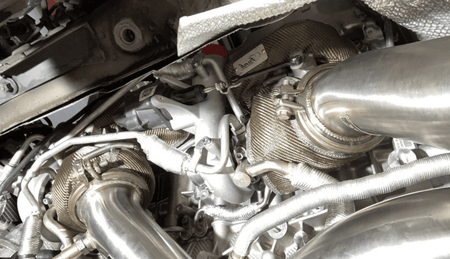 Funk Motorsport F80 BMW M3 turbo blanket draped over engine bay, designed for BMW 3 Series turbocharged engines.