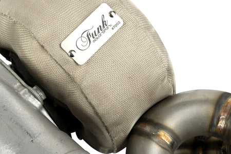 Inside view of Funk Motorsport Abarth Grande Punto turbo blanket showing heat-resistant fabric and secure stitching.