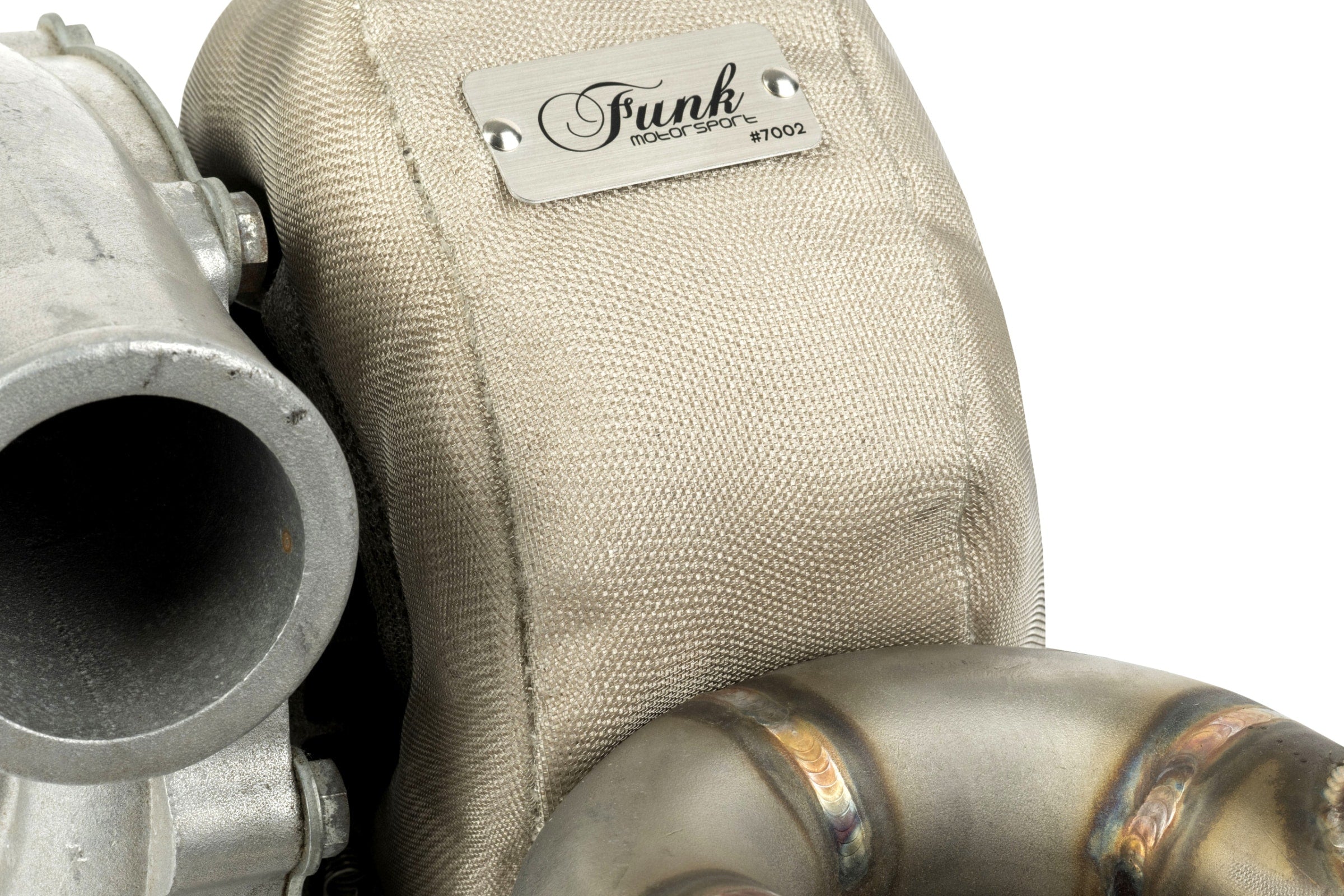 Inside view of a Funk Motorsport 6.5L GMC Yukon turbo blanket showing heat-resistant material and secure fastenings.
