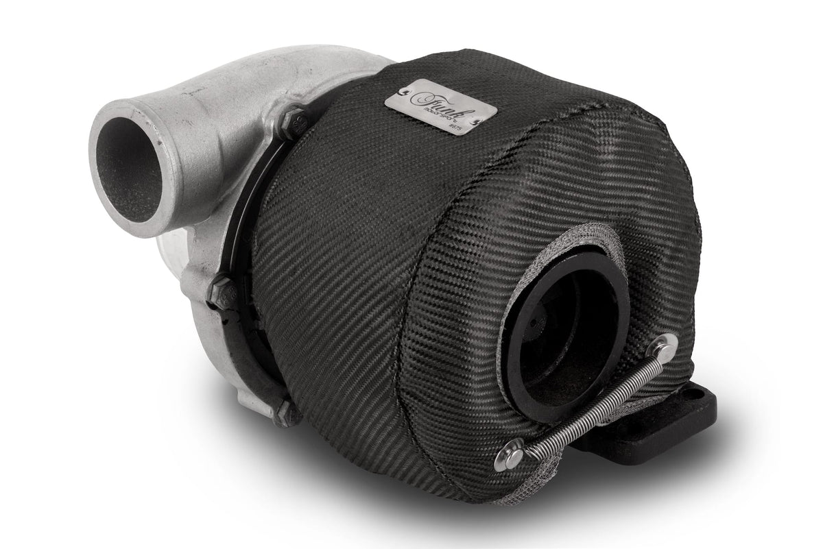 Dodge Ram 3500 6.7L turbo blanket by Funk Motorsport, close-up showing the black insulated turbo blanket on engine component.