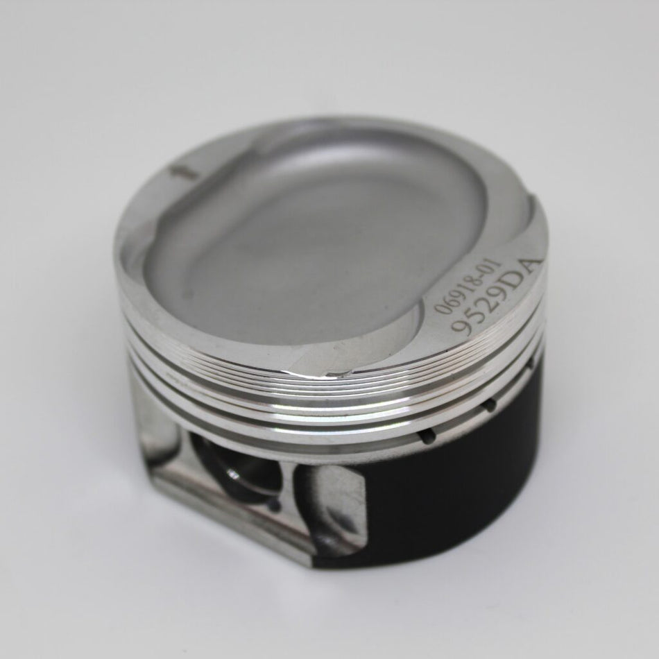 Metallic piston on a white background
