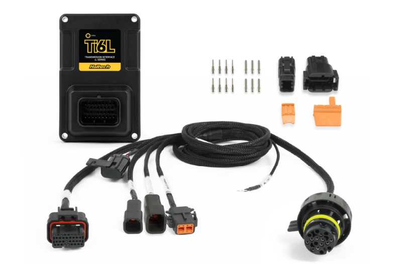 Haltech Nexus IO16 accessory with plug and pin set for vehicle wiring and electronic connections.