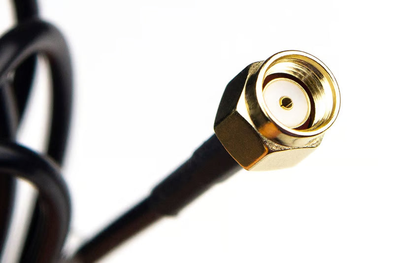 Haltech Wi-Fi Antenna Glass Mount 2.4GHz for Nexus Series, shown attached to vehicle windshield with cable connection.