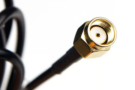 Haltech Wi-Fi Antenna Glass Mount 2.4GHz for Nexus Series, shown attached to vehicle windshield with cable connection.