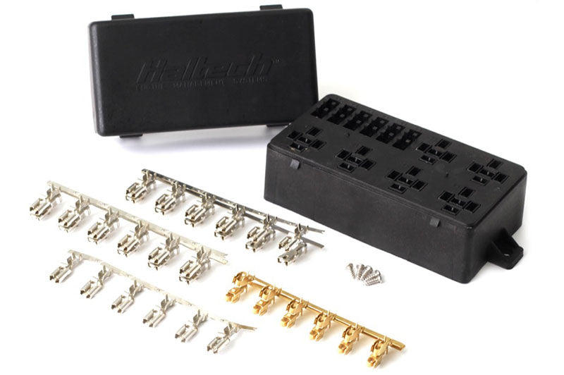 Haltech 6-circuit fuse box with lid and pins, automotive electrical accessory for vehicle wiring and fuse management.