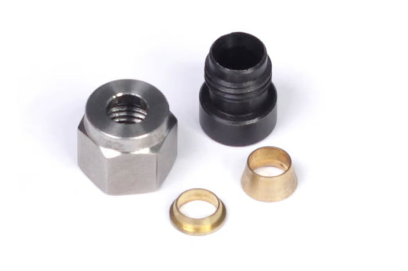 Haltech 1/4-inch mild steel weld-on kit with nut and ferrule, showing the assembled metal fittings for vehicle accessories.