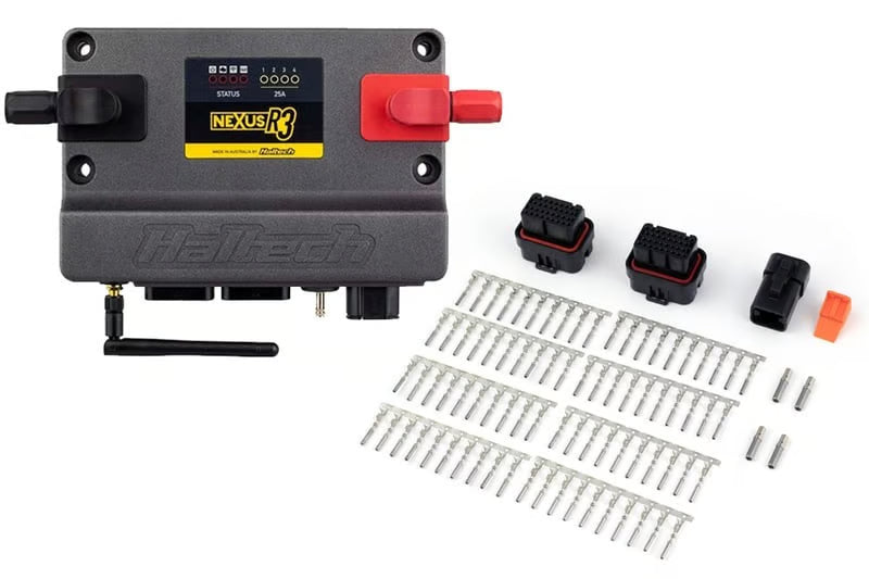 Haltech Nexus R3 VCU with plug and pin set for universal vehicle wiring and electronic control systems.