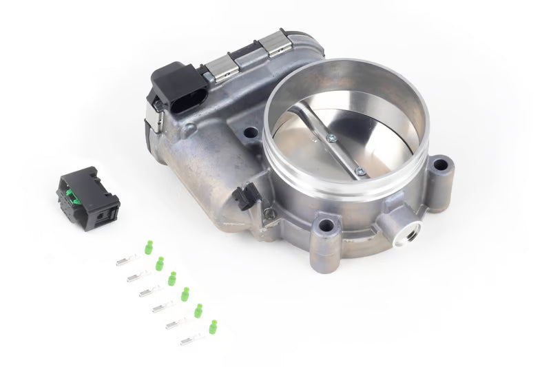 Haltech Bosch 82mm electronic throttle body with connector and pins, showcasing the metal body and electronic components.