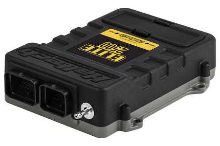 Haltech Elite 2500 ECU with plug and pin set for universal vehicle tuning, featuring electronic control unit and wiring components.