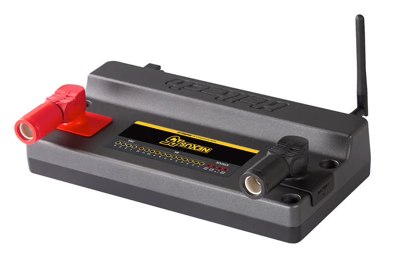 Haltech Nexus R5 universal ECU with plug and pin set, showing connectors and wiring components for automotive tuning.