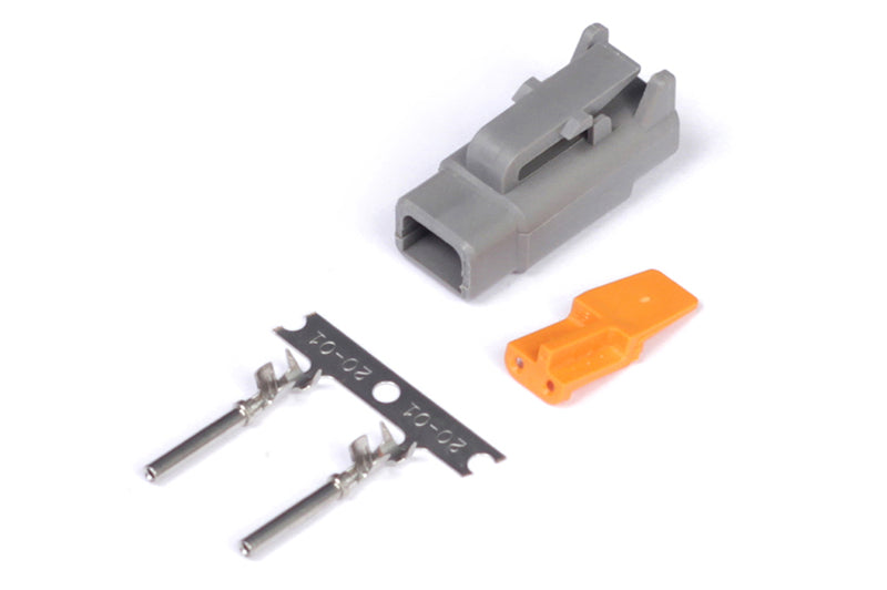 Haltech male Deutsch DTM-2 connector plug and pins for automotive wiring, rated for 7.5 amps, close-up view of accessories.