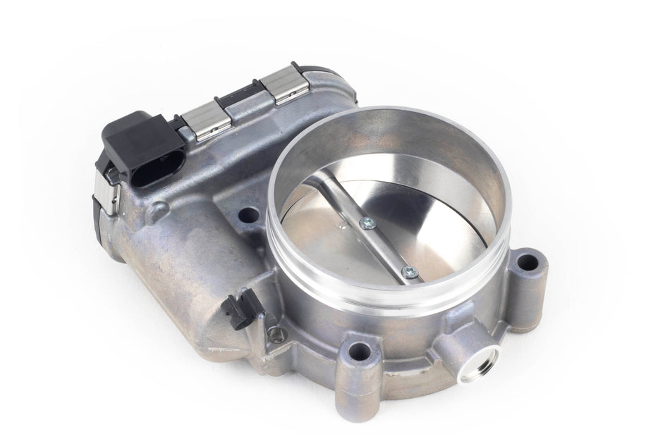 Haltech Bosch 82mm electronic throttle body with connector and pins, showing metallic body and mounting points.