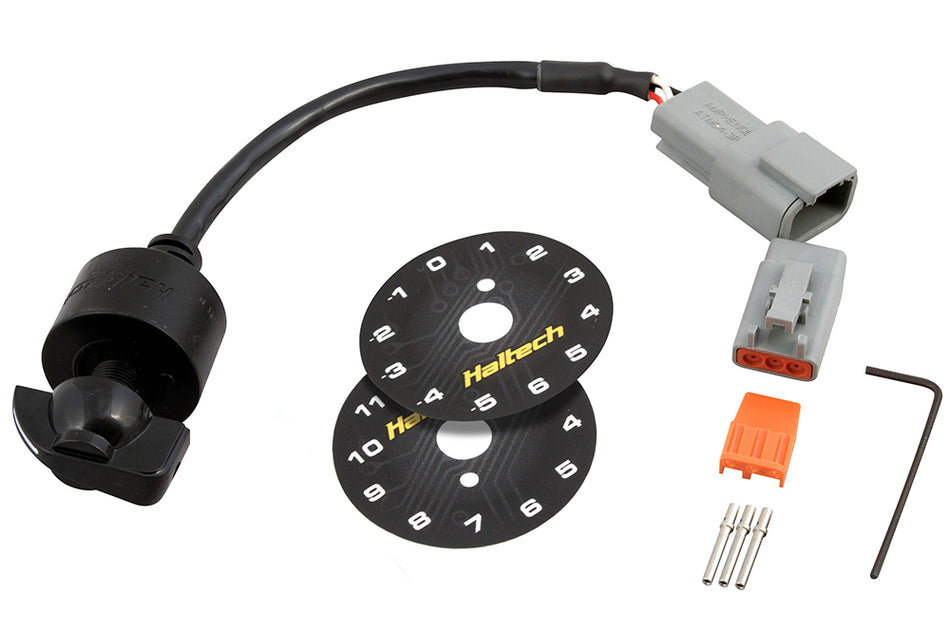 Haltech 12 Position Rotary Trim Module for boost, fuel, and ignition adjustments, shown with knobs and connectors on a white background.