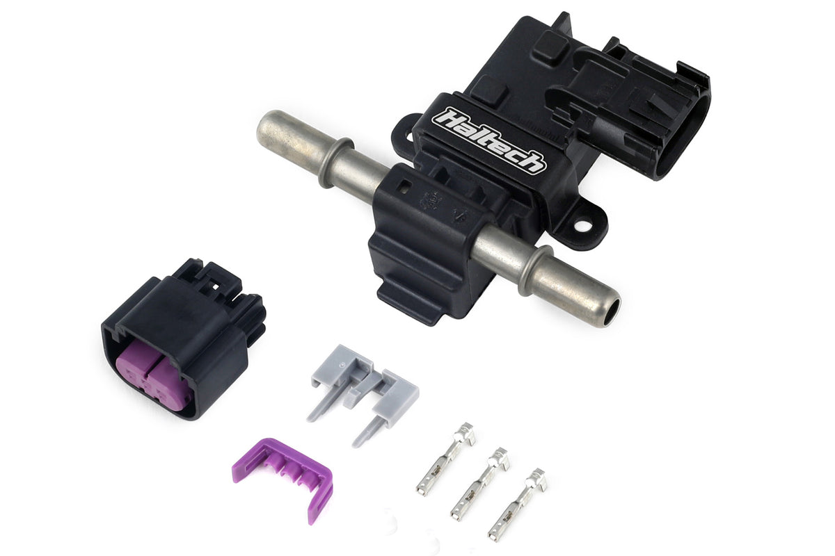 Haltech Flex Fuel Composition Sensor showing a compact electronic sensor with wiring and connectors for fuel analysis.