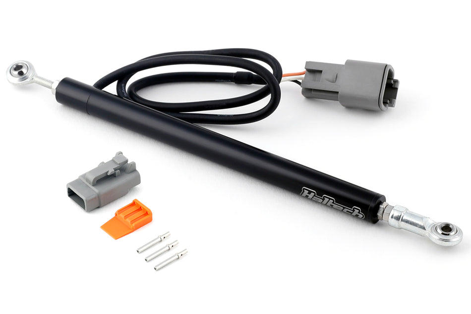 Haltech linear position sensor, 1/2-inch, 50mm travel length, with mounting holes, shown in closed position.