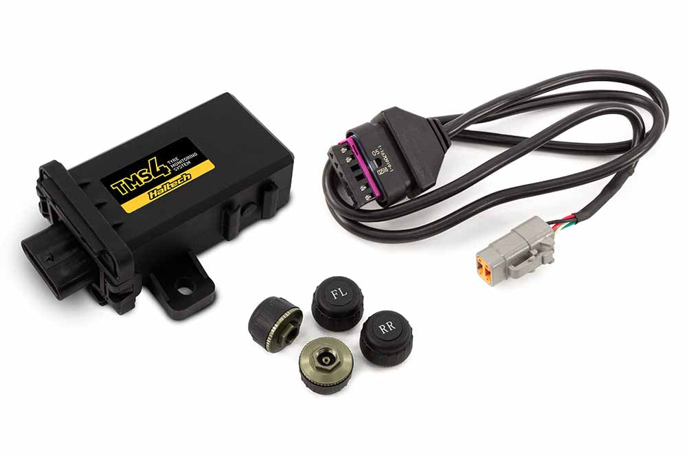 Haltech TMS-4 sensors with external sensors, showing the compact device and wiring for precise automotive temperature monitoring.