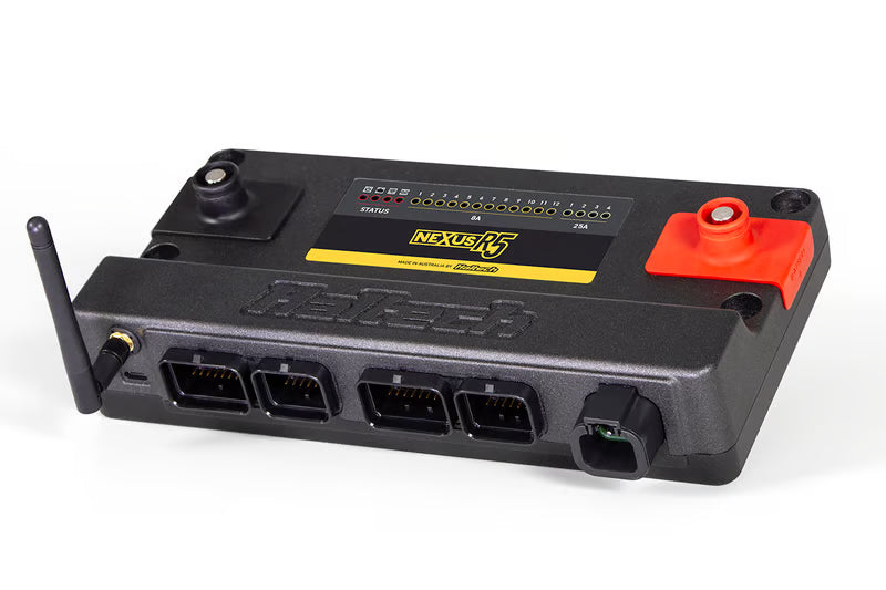 Haltech Nexus R5 universal ECU with plug and pin set for automotive wiring and connections.