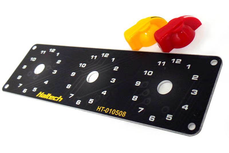 Haltech Triple Switch Panel Kit with yellow and red knobs, automotive accessories for custom control setups.