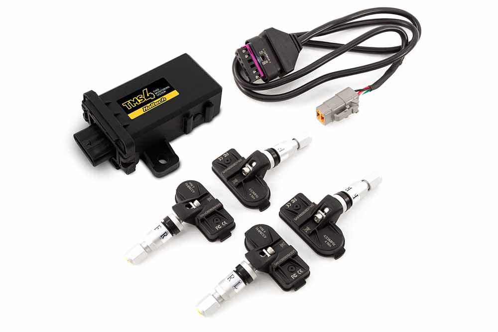 Haltech TMS-4 sensor with internal sensors showing device and sensor ports in a sleek black design