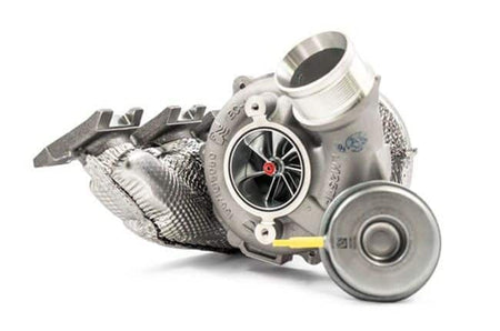 Funk Motorsport Borg Warner TTE700 turbo blanket on a turbocharger for Audi RS3 8V and TTRS engines, showing heat-resistant material.
