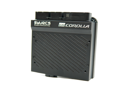 Black electronic module with 'SYVECS' and 'Toyota Corolla' branding on a white background